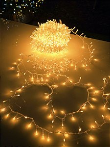 PISCA FESTÃO 1400 LEDS 40 METROS AMBAR FIXO FIO TRANSPARENTE BIVOLT USO INTERNO E EXTERNO