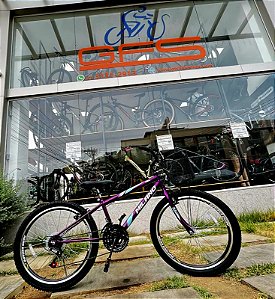 BICICLETA ARO (24) FEMININA COR VIOLETA C/MARCHA 21V FREIO V-BRAKE MARCA MILANO AUTUNM REBAIXADO COM CESTA