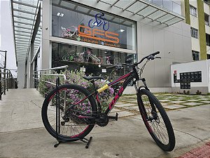BICICLETA MTB ARO (29) OXS ALUMINIO 21 VELOCIDADES FREIO DISC MECÂNICO 15 (P) PRETO/AZUL/ROSA