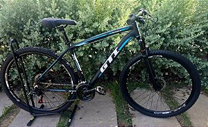 BICICLETA MTB ARO 29 GTI ROMA ALUMINIO 21V IMPORTADO FREIO DISC MECÂNICO 19 (G) PRETO/AZUL
