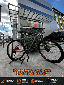 BICICLETA MTB ARO (29) HAVOK NX 18 VELOCIDADES (2X9) FREIO DISC HIDRÁULICO TAMANHO 21 (GG) INOX/LARANJA