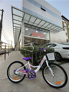 BICICLETA ARO (20) FEMININA CALOI CECI S/ MARCHA FREIO V-BRAKE COM CESTA COR BRANCO/ROXO