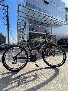 BICICLETA ARO (26) FEMININA COR VIOLETA C/MARCHA 18V MARCA MILANO AUTUNM QUADRO REBAIXADO