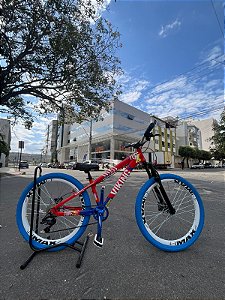 BICICLETA MTB FREERIDE ARO (26) VIKINGX TUFF-25 CAMBIO 8 VELOCIDADES FREIO DISC HIDRAULICO COR VERMELHO/AZUL/AMARELO
