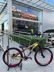 BICICLETA MTB FREERIDE ARO (26) RUSTIC PRO SEM MARCHA FREIO DISC HIDRÁULICO MT200 TRASEIRO COR CAMALEAO/VERMELHO