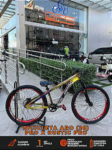 BICICLETA MTB FREERIDE ARO (26) RUSTIC PRO SEM MARCHA FREIO DISC HIDRÁULICO TRASEIRO COR CAMALEAO/VERMELHO