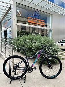 BICICLETA MTB ARO (29) OGGI FLOAT 5.0 SHIMANO TOURNEY 24V FREIO DISC HIDRÁULICO TAMANHO15 (P) COR GFT/ROSA/AZUL (USADA)