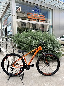 BICICLETA MTB ARO (29) OXS ALUMINIO 21 VELOCIDADES FREIO DISC MECÂNICO 15 (P) LARANJA/VINHO