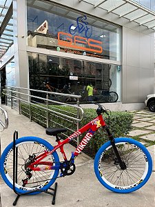 BICICLETA MTB FREERIDE ARO (26) VIKINGX TUFF X-25 CAMBIO 7VELOCIDADES (1X7) FREIO DISCO MECÂNICO COR VERMELHO/AZUL