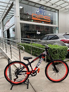 BICICLETA MTB FREERIDE ARO (26) VIKINGX TUFF X-25 CAMBIO 7VELOCIDADES (1X7) FREIO DISCO MECÂNICO COR ROXO/LARANJA