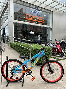 BICICLETA MTB FREERIDE ARO (26) VIKINGX TUFF X-25 CAMBIO 7VELOCIDADES (1X7) FREIO DISCO MECÂNICO COR AZUL/LARANJA