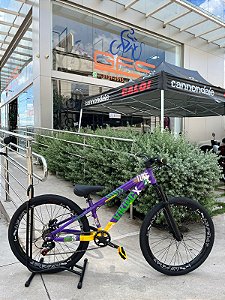 BICICLETA MTB FREERIDE ARO (26) VIKINGX TUFF-25 KIT 7 VELOCIDADES FREIO DISC HIDRÁULICO TRASEIRO COR ROXO/AMARELO