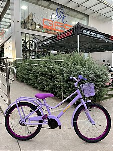 BICICLETA ARO (20) FEMININA COR VIOLETA SEM MARCHA COM CESTA MARCA MONARK BRISA