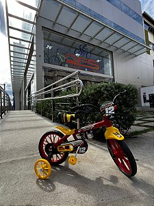 BICICLETA ARO (12) MASCULINA COR VERMELHO/AMARELO S/MARCHA NATHOR MOTOR X