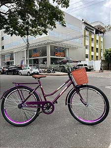 BICICLETA ARO (26) FEMININA COR VIOLETA S/MARCHA FREIO V/BRAKE (A MÃO) E FREIO CONTRA PEDAL MARCA ATTACK TROPYMAX