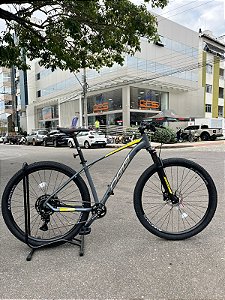 BICICLETA MTB ARO (29) OGGI 7.0 SHIMANO CUES 9 VELOCIDADES FREIO DISC HIDRÁULICO TAMANHO 17 (M) GRAFITE/AMARELO