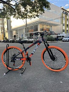 BICICLETA MTB FREERIDE ARO (26) VIKINGX TUFF-25 KIT 7 VELOCIDADES (1X7) FREIO A DISCO MECÂNICO COR ROXO/LARANJA