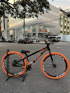 BICICLETA MTB FREERIDE ARO (26) HUPI STRIP KIT SINGLE (SEM MARCHA) FREIO DISC TRASEIRO SHIMANO MT200 COR PRETO/LARANJA
