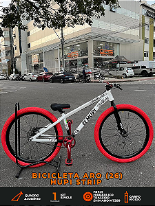 BICICLETA MTB FREERIDE ARO (26) HUPI STRIP KIT SINGLE (SEM MARCHA) FREIO DISC TRASEIRO SHIMANO MT200 COR BRANCO/VERMELHO