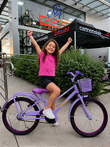 BICICLETA ARO (20) FEMININA COR VIOLETA SEM MARCHA COM CESTA MARCA MONARK BRISA
