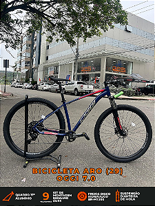 BICICLETA MTB ARO (29) OGGI BW 7.0 SHIMANO CUES 9 VELOCIDADES FREIO DISC HIDRÁULICO TAMANHO 17 (M) AZUL/VERMELHO