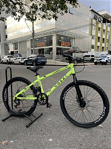 BICICLETA ARO (24) MTB MASCULINA/FEMININA COLLI AIRON 7 VELOCIDADES (1X7) FREIO A DISCO MECÂNICO COR AMARELO NEON