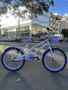 BICICLETA ARO (20) FEMININA COLLI CELINA SEM MARCHA FREIO V-BRAKE COM CESTA BRANCO/LILAS
