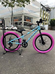 BICICLETA ARO (20) MTB COLLI GRAUZINHA 7 VELOCIDADES (1X7) FREIO A DISCO MECÂNICO COR CHAMPANHE PNEU PINK