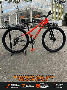 BICICLETA MTB ARO (29) VELOOH START 7 VELOCIDADES FREIO A DISCO MECÂNICO TAMANHO 13 (PP) COR LARANJA/PRETO