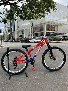 BICICLETA MTB FREERIDE ARO (26) VIKINGX TUFF-25 KIT 7 VELOCIDADES FREIO A DISCO MECÂNICO COR VERMELHO/AZUL/BRANCO