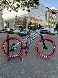 BICICLETA MTB FREERIDE ARO (26) VIKINGX TUFF-25 KIT 7 VELOCIDADES FREIO A DISCO MECÂNICO COR PRATA/AZUL/VERMELHO