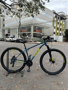 BICICLETA MTB ARO (29) CALOI ASPEN 24 VELOCIDADES(3X8) FREIO DISC MECÂNICO TAMANHO 17 (M) COR AZUL/AMARELO