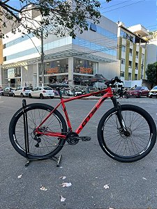 BICICLETA MTB ARO (29) GTS RDX KIT 21 VELOCIDADES (3X7)FREIO DISCO MECÂNICO TAMANHO (21) COR VERMELHO/PRETO (USADA)