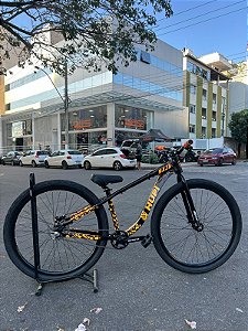 BICICLETA MTB FREERIDE ARO (29) HUPI NAJA KIT SINGLE S/MARCHA FREIO DISC HIDRÁULICO TRASEIRO SHIMANO COR PRETO/LARANJA