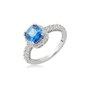 Anel cravejado de zircônia safira e cristal banho em ródio branco