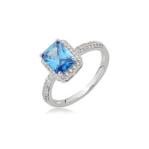 Anel cravejado de zircônia safira e cristal banho em ródio branco