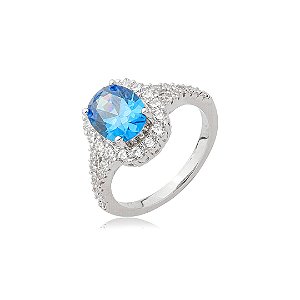 Anel cravejado de zircônia safira e cristal banho em ródio branco