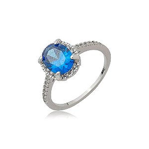 Anel cravejado de zircônia safira e cristal banho em ródio branco