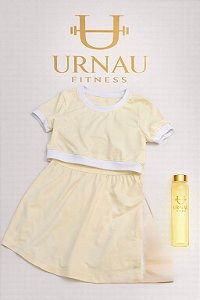 Conjunto de croped com bojo removível amarelo manteiga com detalhes branco e saia com short - Tamanho: M
