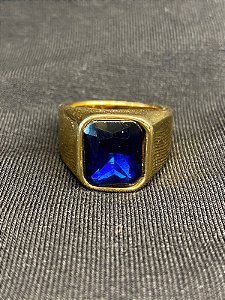 DEDEIRA COM PEDRA AZUL BANHADA A OURO 18K