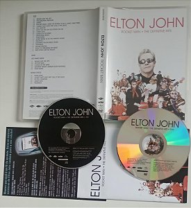 Dvd Elton John - Rocket Man / Definitive Hits Editora [seminovo]