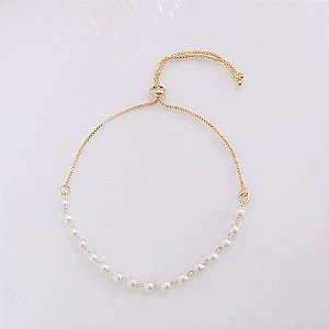 Pulseira ajustável com mini pérolas no ouro