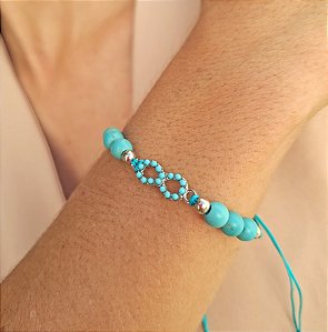 Pulseira Regulável Turquesa com Símbolo Infinito
