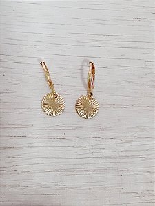 Argola com moeda riscada