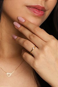 ANEL SOLITÁRIO DE ZIRCÔNIA OURO 18K. OBS. NUMERAÇÃO DISPONÍVEL ATÉ 24.