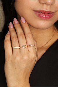 ANEL CORAÇÃO VAZADO COM PEDRAS DE ZIRCÔNIA OURO 18K. OBS NUMERÇÃO DISPONÍVEL ATÉ 24.