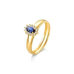 ANEL ZIRCÔNIA OVAL AZUL/BRANCA OURO 18K. OBS. NÚMERAÇÃO DISPONIVEÍS ATÉ 24.