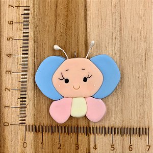 BISCUIT BORBOLETA ROSTO AZUL COM ROSA BEBÊ