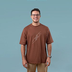 CAMISETA MASCULINA OVERSIZED - NAS MÃOS DE JESUS