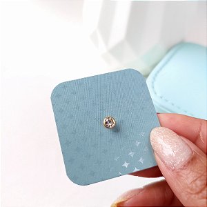 Piercing tragus ponto de luz dourado